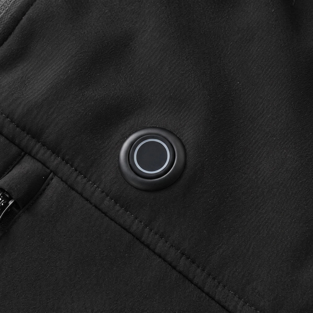 Bouton de chauffe rond sur la poitrine de la veste noire
