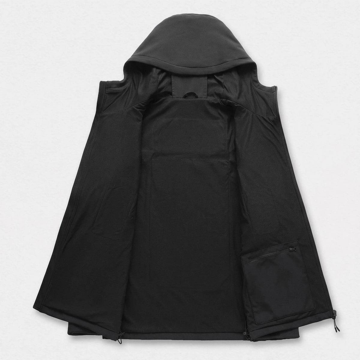 Intérieur de la veste noire ouverte : doublure brossée et poche intérieure zippée