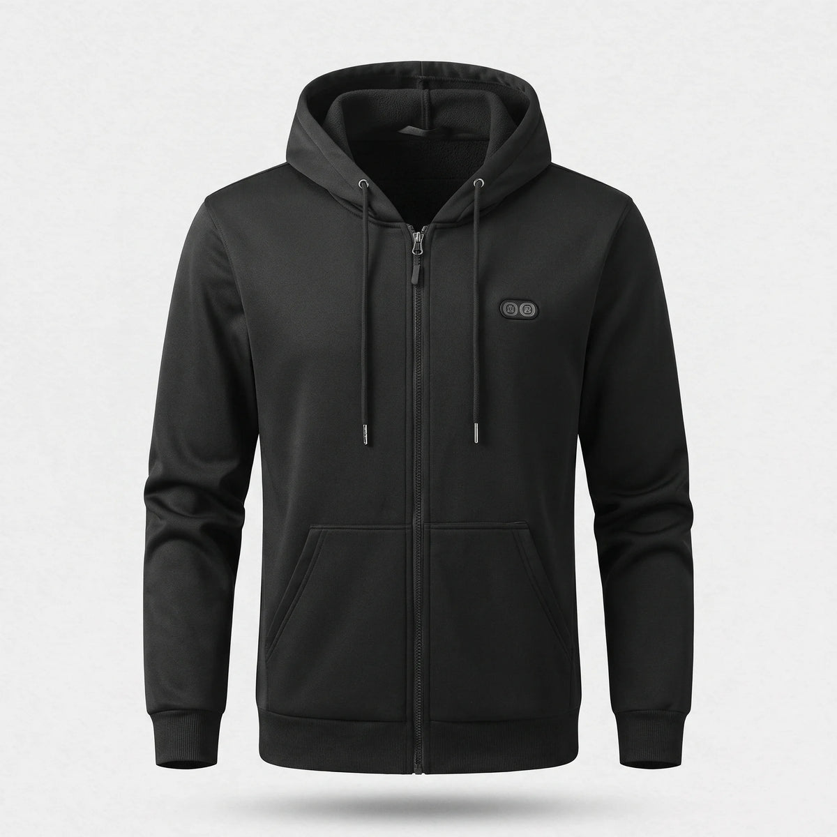 Sweat chauffant zippé noir vu de face : capuche à cordons, poches kangourou, boîtier ovale sur la poitrine