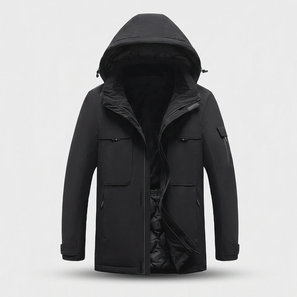 Parka chauffante courte noire vue de face : col doublé de peluche, deux poches de poitrine à rabat