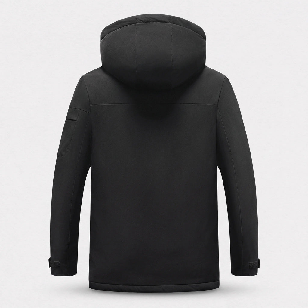 Dos de la parka chauffante courte noire, capuche relevée et poche zippée sur la manche