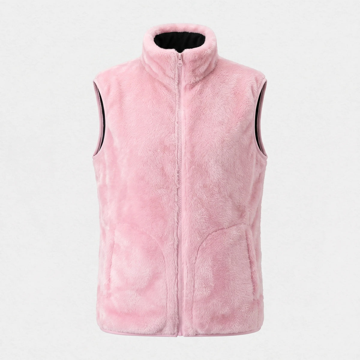 Gilet chauffant en peluche rose clair vu de face : col montant doublé noir, fermeture pleine longueur
