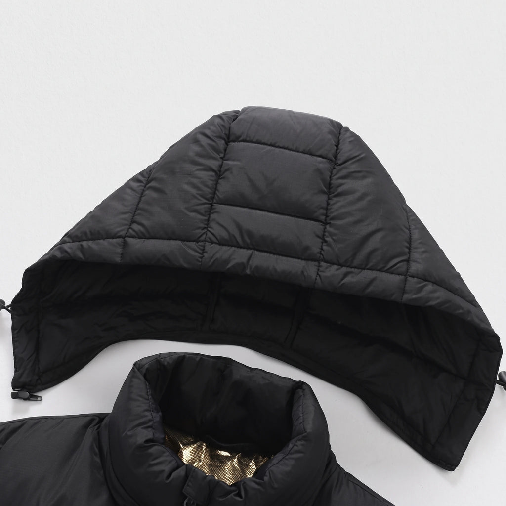 Capuche matelassée à cordons et col montant doublé d'une doublure dorée réfléchissante